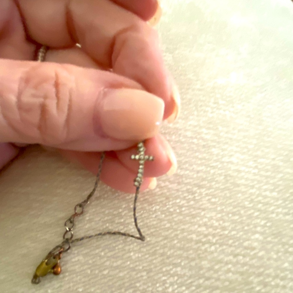 Faux Diamond tiny cross bracelet.
